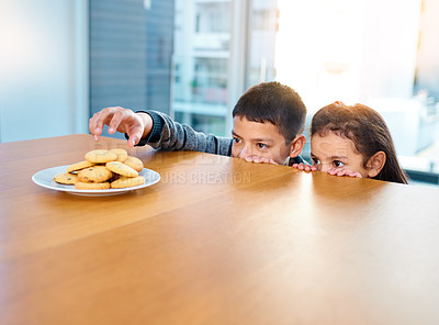 Buy stock photo Home, siblings and steal of cookies, kitchen and boy with girl, hungry and together for biscuits. House, child and kid in morning, bonding and plate on table, brother and sister, cute and weekend