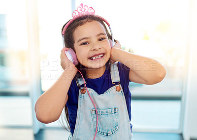 Buy stock photo Young child, headphones and portrait for music listening in house with streaming song, radio sound and girl podcast. Happy, kid and earphones for media with smile, fun audio and playlist by window