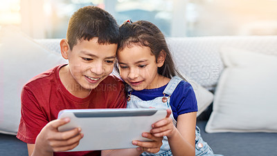 Buy stock photo Tablet, children and siblings on couch for play, online and esports for entertainment. Technology, streaming and internet for video in lounge, smile and gaming on digital or mobile app on touchscreen
