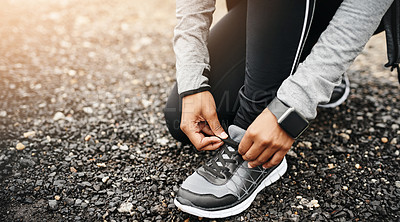 Buy stock photo Person, hands and shoelace with running or exercise for fitness, health and wellbeing in outdoor. Above, sneakers and committed on workout or jog in morning for training, wellness and self care