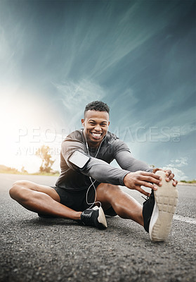 Buy stock photo Portrait of a sporty young man exercising outdoors