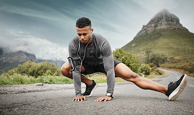 Buy stock photo Man, stretching legs and music before exercise, fitness and workout on road outdoor. Male athlete, headset and training for health, wellness and flexibility with endurance or balance in nature