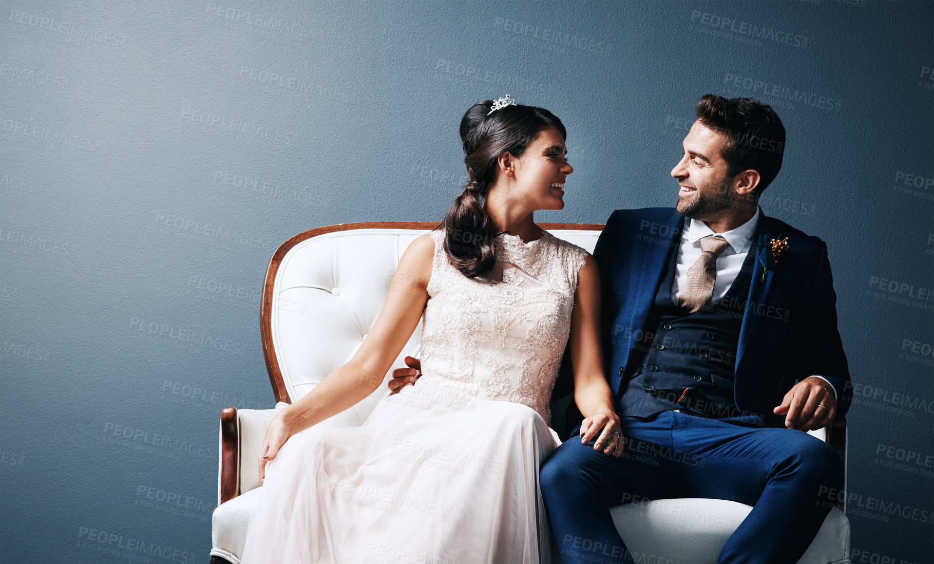 Buy stock photo Bride, man or smile on blue background with chair for marriage, wedding with soulmate and trust. Happy couple, unity or studio with excitement for commitment to love, together in New York City