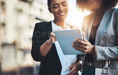 Buy stock photo Business people, hands and tablet in city for social media, communication or team collaboration. Hand of woman employee in teamwork working on technology for online research or networking in town