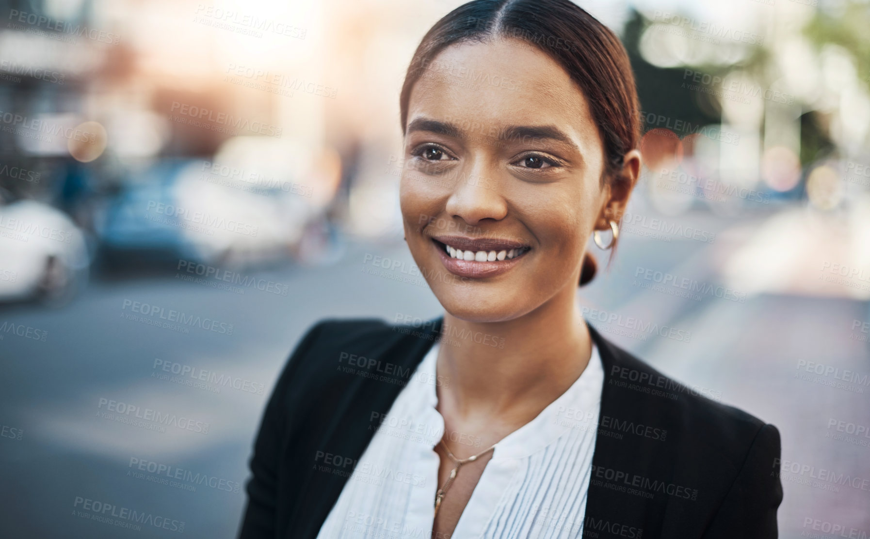 Buy stock photo Shot of a young businesswoman in the city