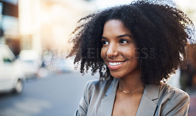 Buy stock photo Shot of a young businesswoman in the city