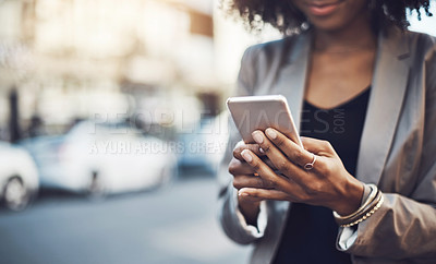 Buy stock photo Woman, hands and phone in city for communication, social media or chatting and texting outdoors. Hand of business female on mobile smartphone for online browsing, travel or networking in a urban town