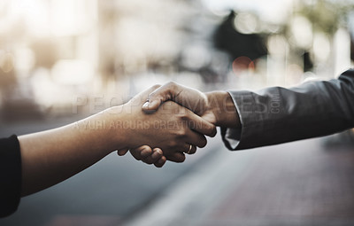 Buy stock photo Business people, handshake and meeting in city for partnership, introduction or greeting outdoors. Hand of employees shaking hands for b2b, collaboration or agreement in deal or hiring in urban town