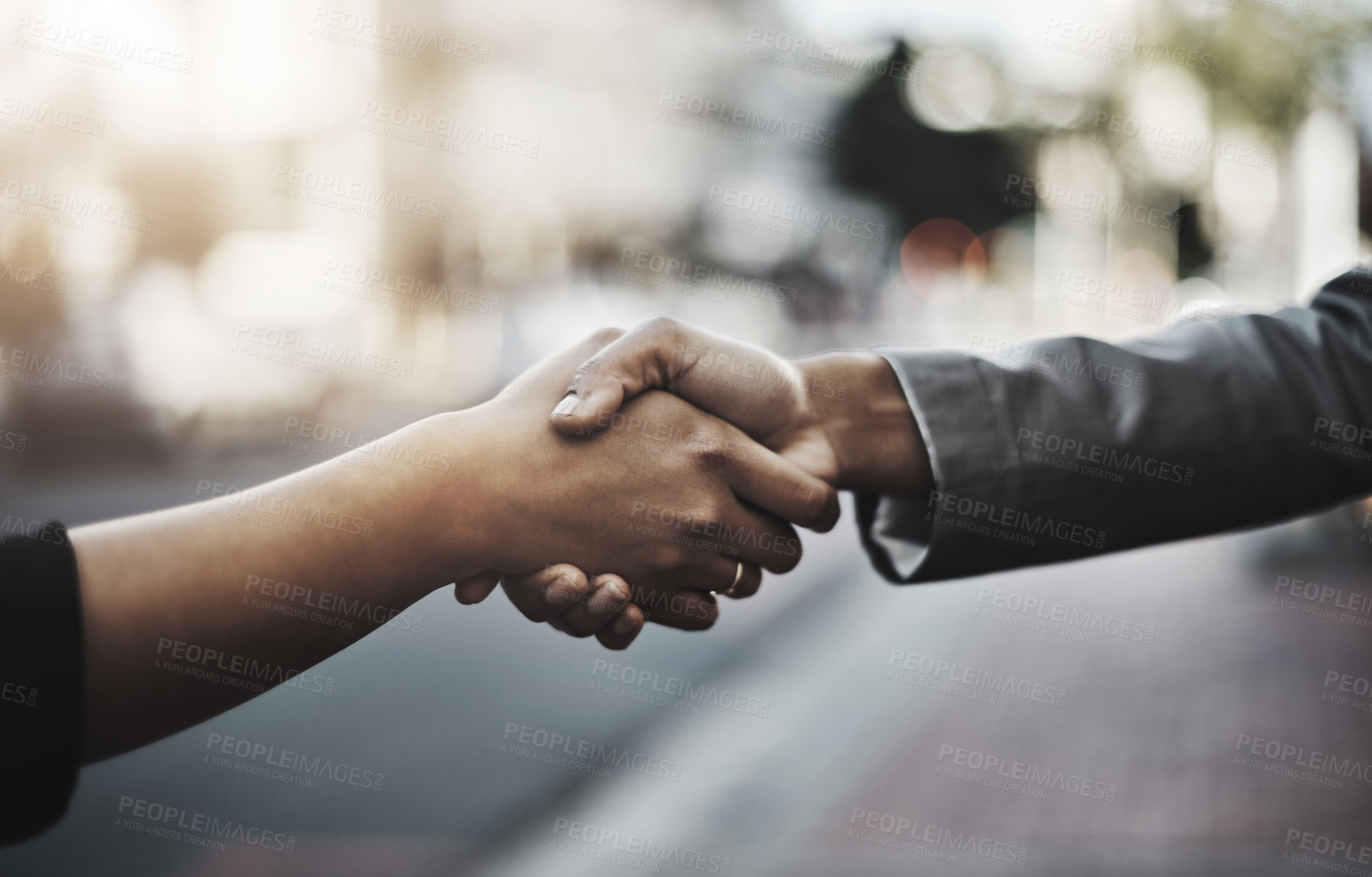 Buy stock photo Business people, handshake and meeting in city for partnership, introduction or greeting outdoors. Hand of employees shaking hands for b2b, collaboration or agreement in deal or hiring in urban town