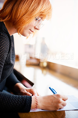 Buy stock photo Woman, writing and startup in cafe with checklist, stock control and feedback in restaurant. Business owner, female manager and paperwork with pen for schedule, survey and inventory in cafeteria