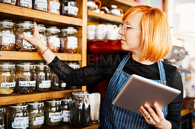 Buy stock photo Barista, woman and tablet for menu checklist or online order on website in startup cafe. Small business owner, waiter and review with technology for stock inventory or coffee shop price in store