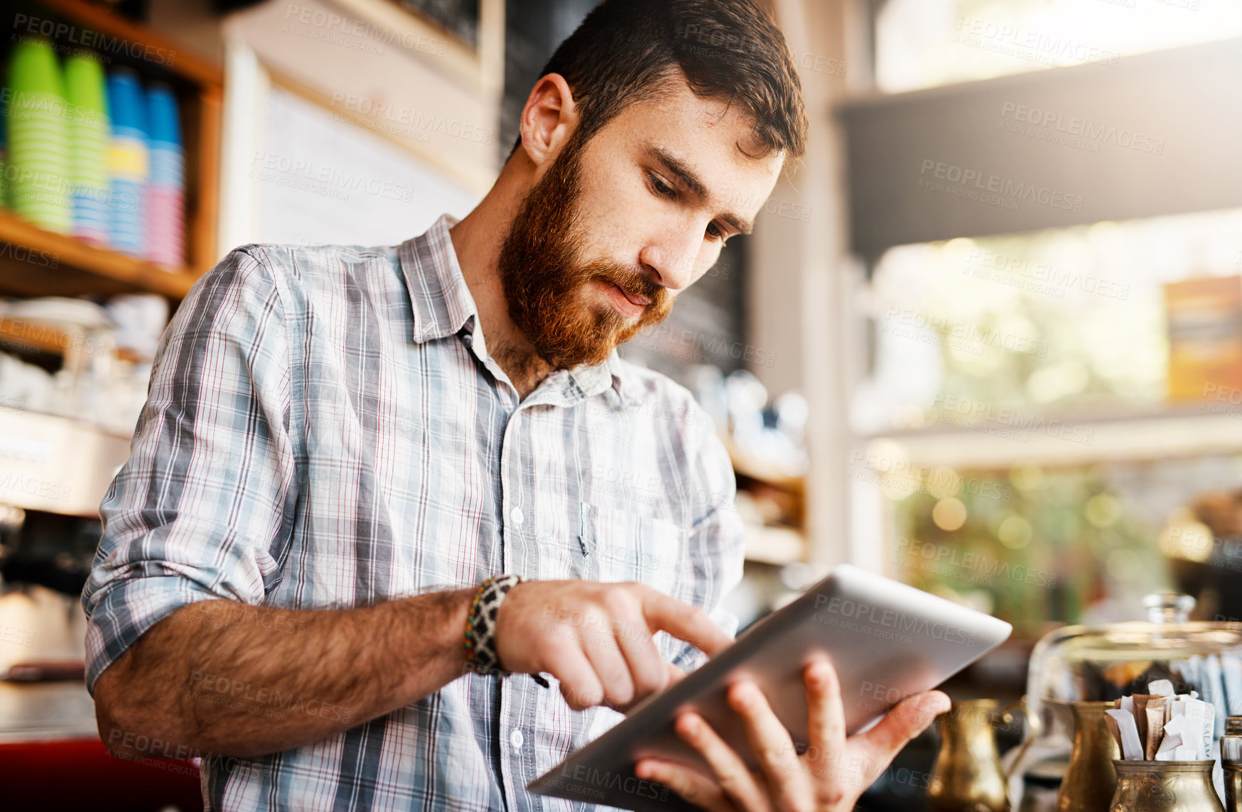 Buy stock photo Barista, man and tablet for cafe menu or online order on website in startup coffee shop. Small business owner, waiter and review with technology for stock inventory or price checklist in store