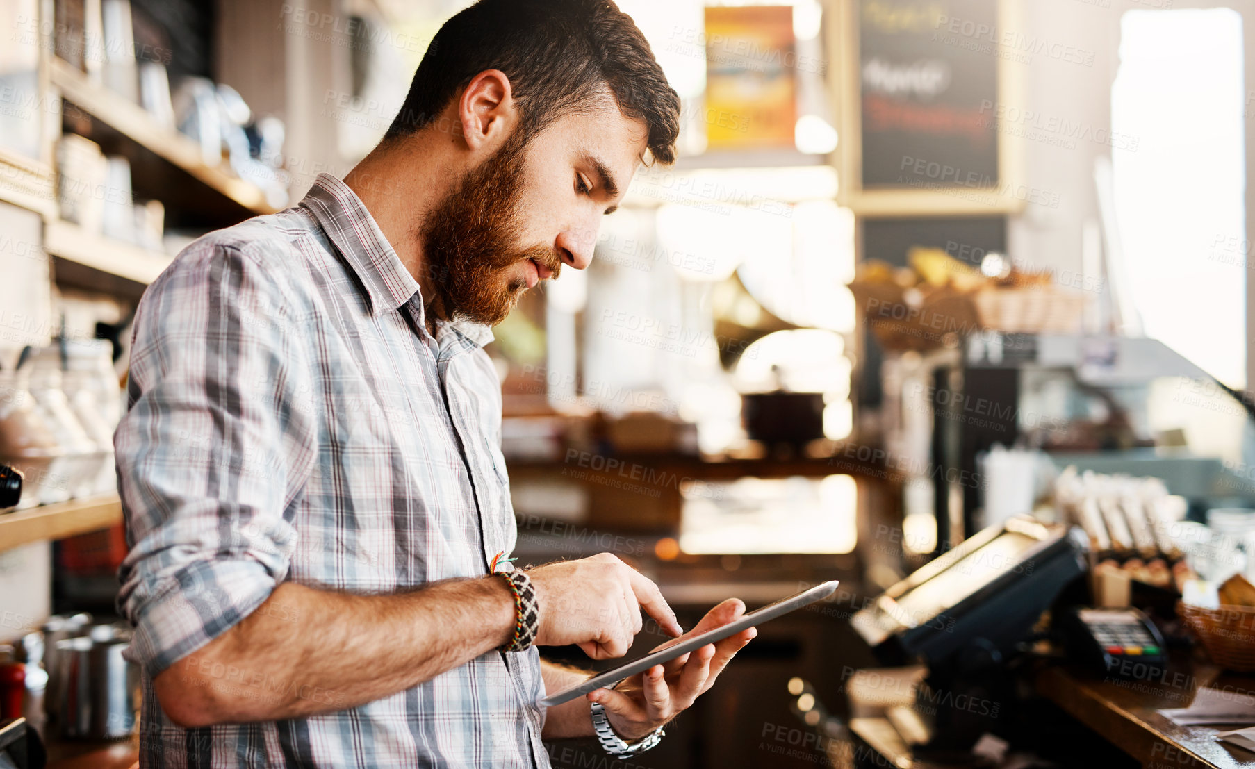 Buy stock photo Barista, man and tablet for small business menu or online order on website in startup cafe. Coffee shop owner, waiter and review with technology for stock inventory or price checklist in store