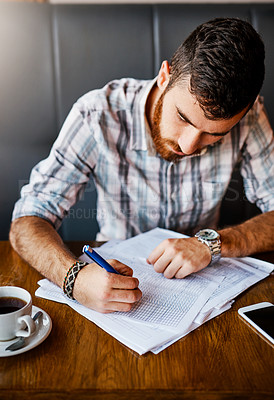 Buy stock photo Writing, cafe and man with paperwork, serious and invoice for vendor, planning and small business. Coffee shop, entrepreneur and person with documents, inventory and checklist for stock on table