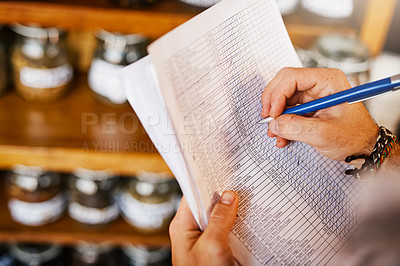 Buy stock photo Hands, shop owner and writing with paperwork in cafe with review for inventory, stock and ingredients. Person, documents and checklist with notes by shelf for coffee, tea and stats at restaurant