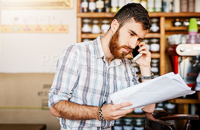 Buy stock photo Man, phone call and owner at coffee shop with documents, thinking and negotiation for price, order and deal. Barista, smartphone and paperwork for invoice, inventory and contact supplier in cafe