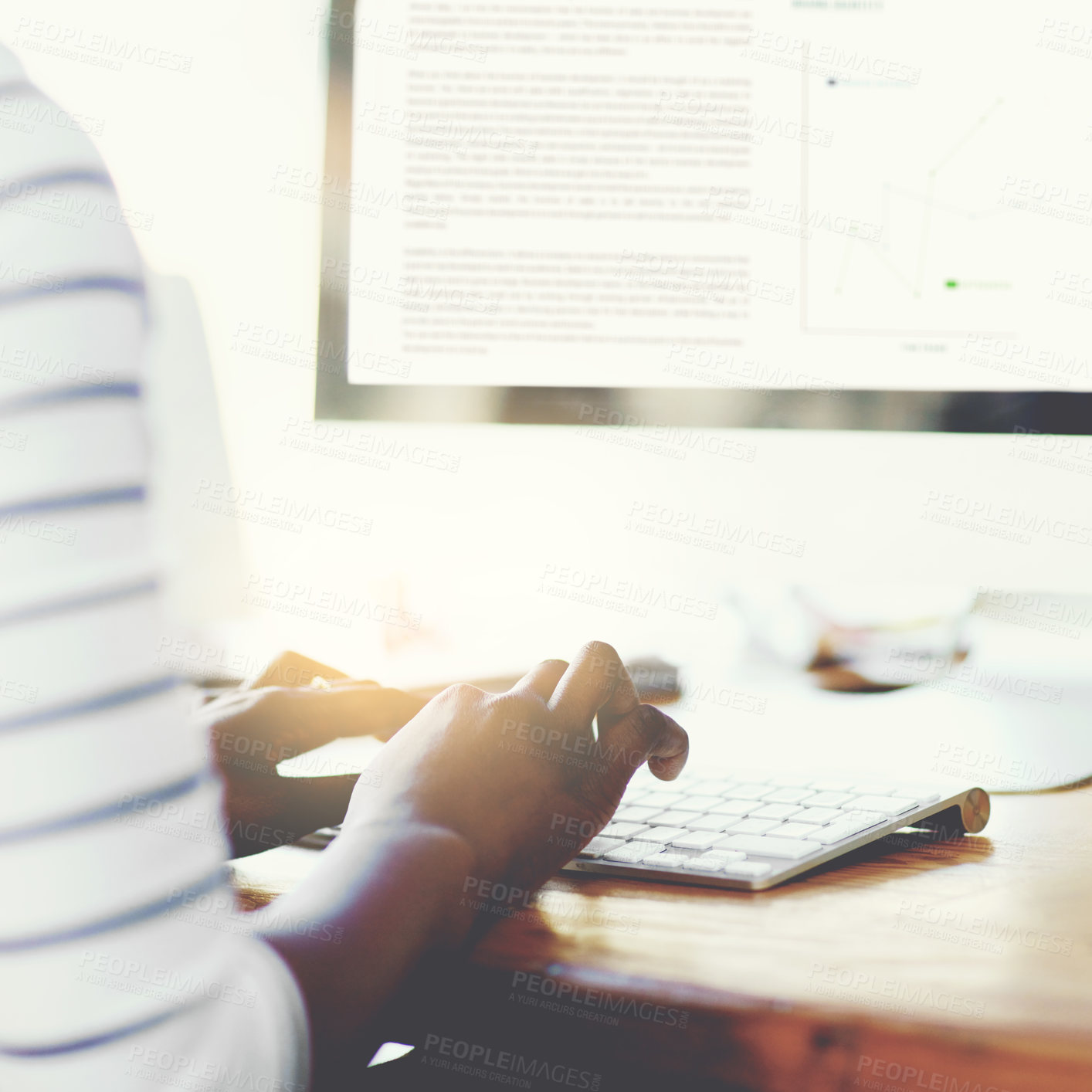 Buy stock photo Closeup shot of an unrecognizable businesswoman working on a computer in an office