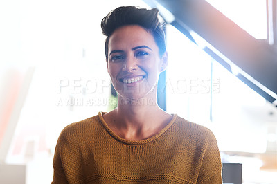 Buy stock photo Cropped portrait of a confident and attractive young businesswoman standing in an office