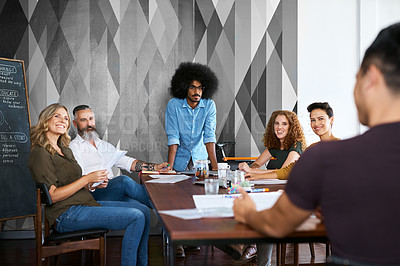 Buy stock photo Cropped shot of a group of designers having a meeting in their creative office