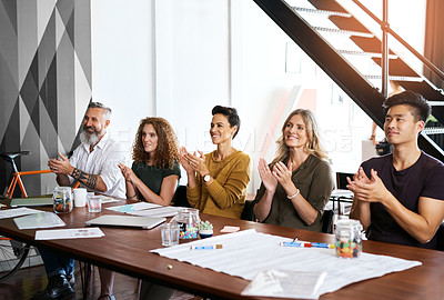 Buy stock photo Cropped shot of a group of businesspeople applauding in an office during a meeting