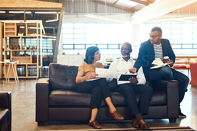 Buy stock photo Full length shot of a group of designers having a discussion in an office