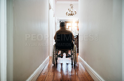 Buy stock photo Rearview shot of a senior woman sitting in her wheelchair at home