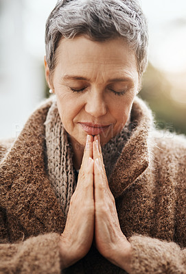 Buy stock photo Senior woman is praying, hands with worship and religion, God with peace, gratitude and faith outdoor. Spiritual female person in nature with face, eyes closed and prayer for guidance and blessing
