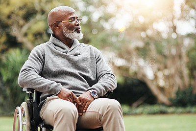 Buy stock photo Shot of a handsome senior man sitting in his wheelchair outside