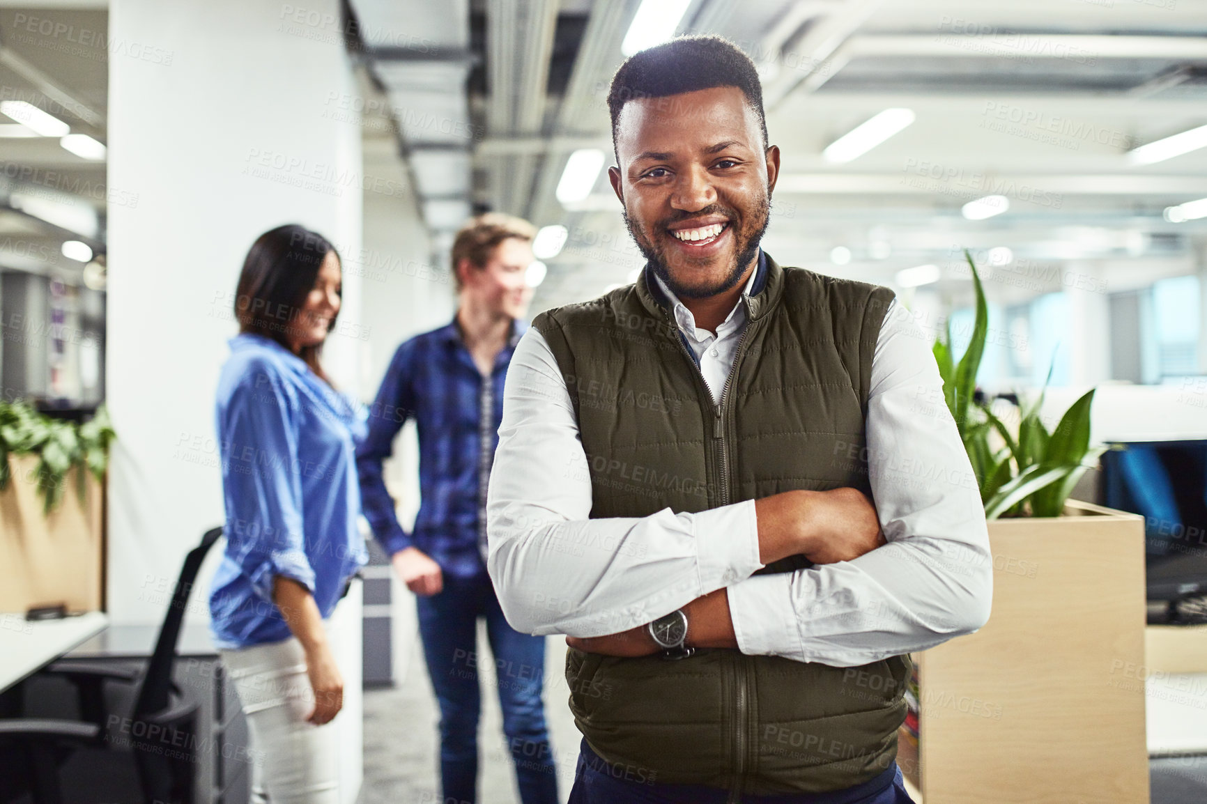 Buy stock photo Businessman, portrait and happy in office with arms crossed, employee and confidence. Pride, about us and startup company with entrepreneur for career, smile and coworkers positivity in workplace.