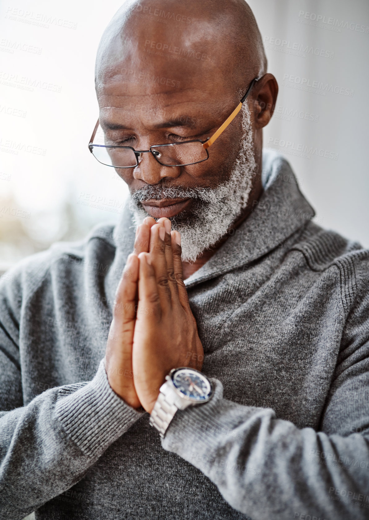 Buy stock photo Prayer, faith and senior black man worship God for hope, help or spiritual gratitude in home. Christian, retirement and person in meditation for religion, peace and praise Jesus Christ or Holy Spirit