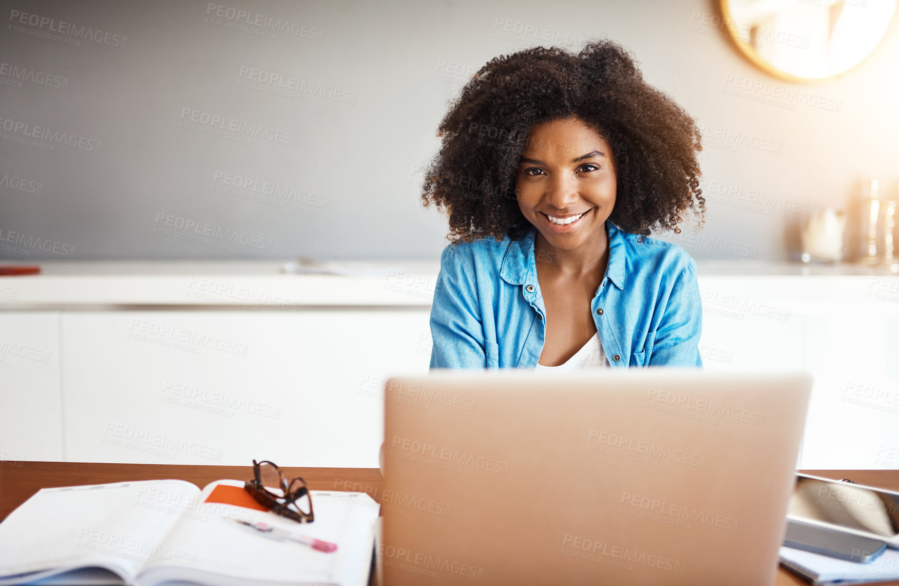 Buy stock photo Student, happy and home or portrait on laptop, online assignment submission for university and apartment. Black woman browsing, books and citation research for project, academic website and elearning