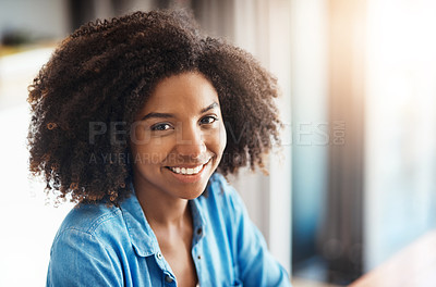 Buy stock photo Portrait of an attractive young woman working at home