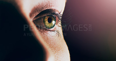 Buy stock photo Closeup shot of  man opening his eyes against a dark background