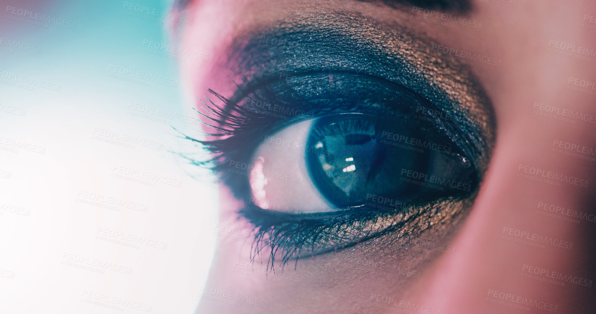 Buy stock photo Closeup shot of a beautiful young woman's eye against a bright background