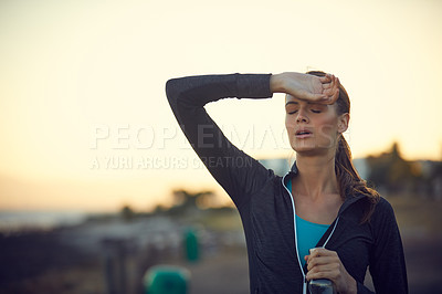 Buy stock photo Shot of an attractive young woman running outdoors