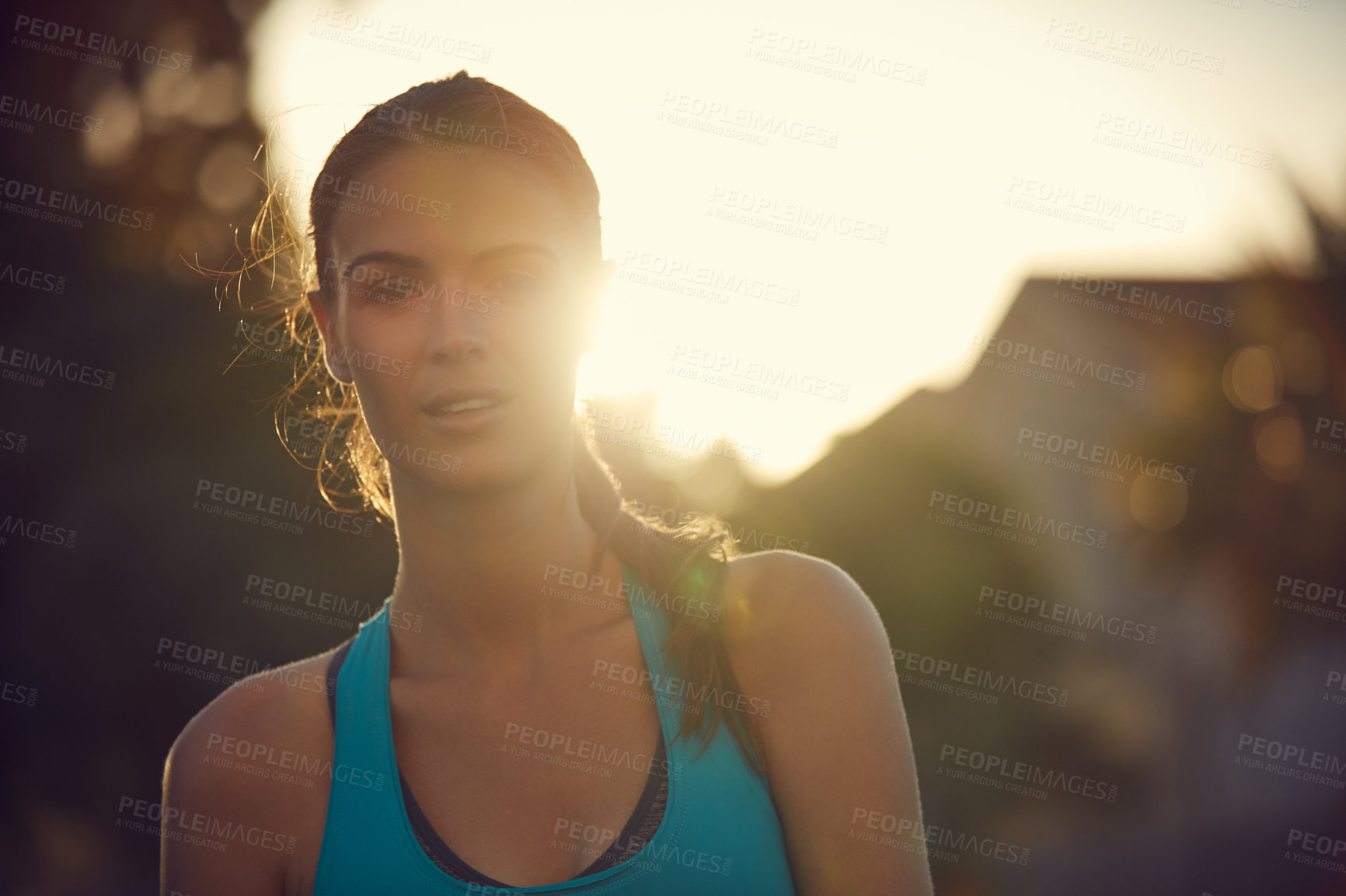 Buy stock photo Portrait of a sporty young woman exercising outdoors