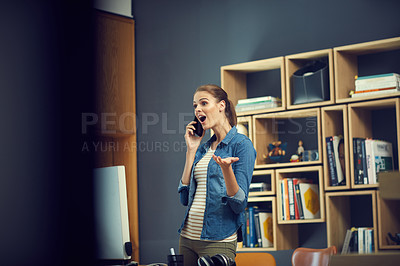 Buy stock photo Shot of a young businesswoman using a mobile phone and looking surprised in a modern office