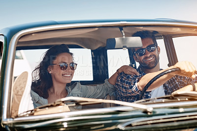 Buy stock photo Cropped shot of an affectionate couple enjoying a summer road trip
