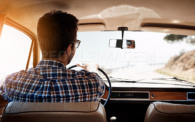 Buy stock photo Rearview shot of a young man out on a road trip