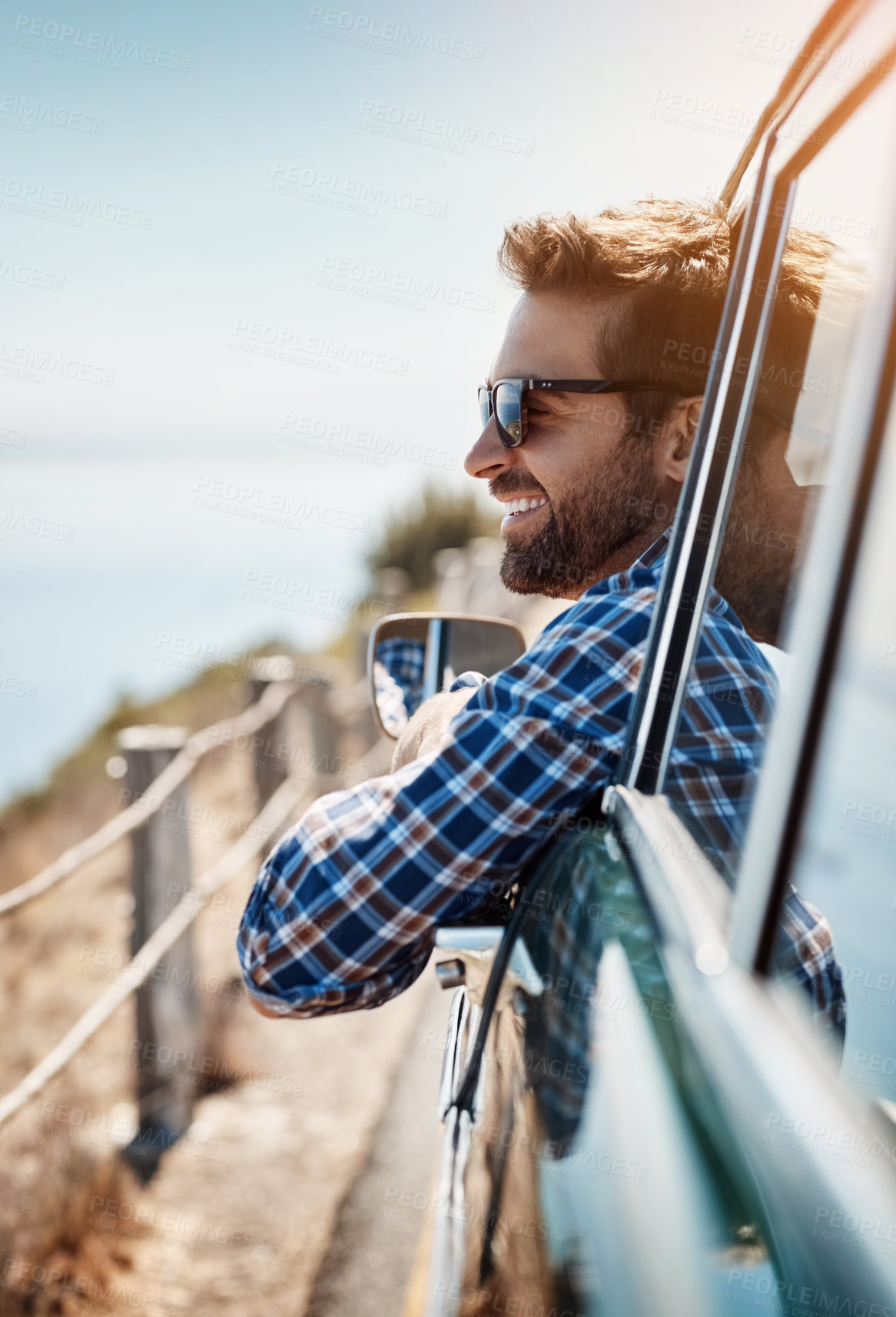 Buy stock photo Road trip, travel and man in window of car driving for adventure, summer vacation and holiday. Transportation, relax and face of male person in motor vehicle for freedom, journey and happy by ocean