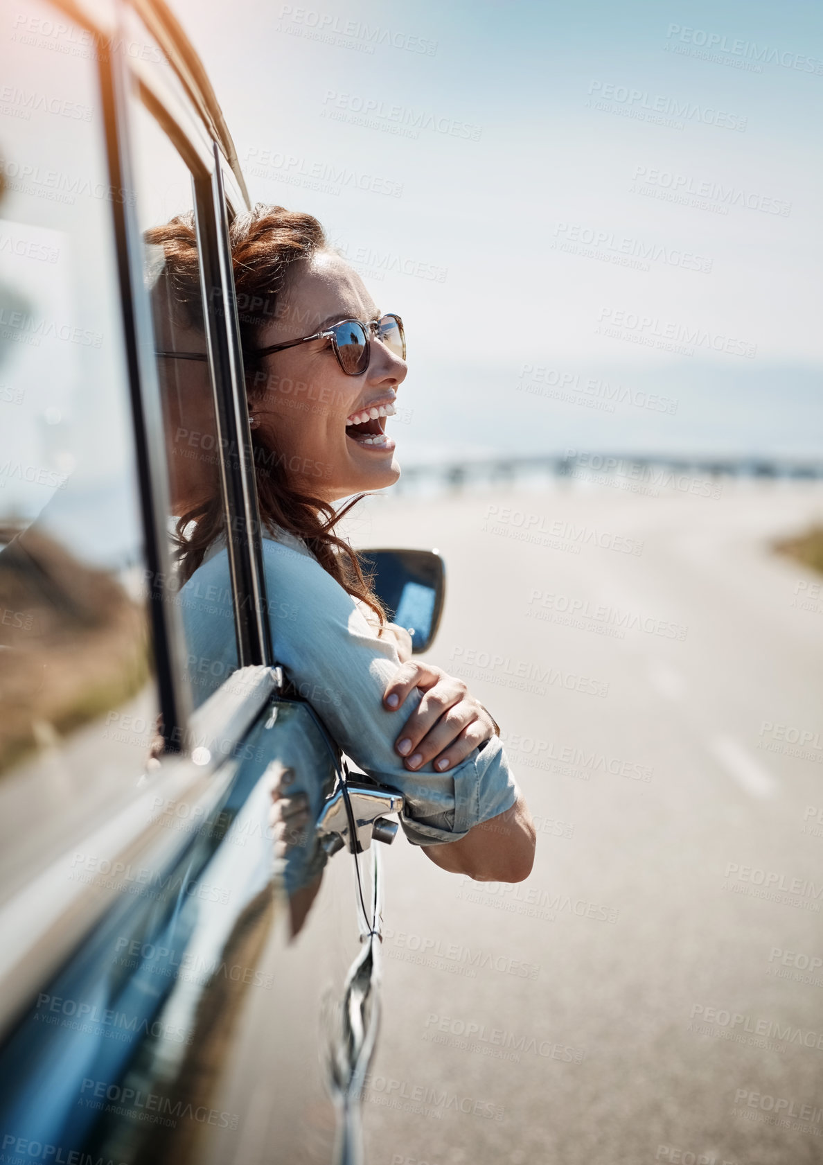 Buy stock photo Happy, freedom and road trip with a woman in a car, looking at the view from the window while on the open road. Smile, travel and fun with a young female traveler on a journey during her vacation