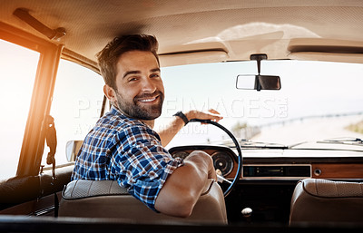 Buy stock photo Rearview portrait of a handsome man enjoying a summer road trip