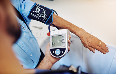 Buy stock photo Blood pressure, hands and patient with nurse for checkup, wellness or assessment of heart rate in clinic. Medical exam, person or cardiologist in hospital to monitor pulse, hypertension or healthcare