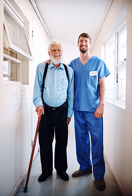 Buy stock photo Healthcare, homecare and caregiver with senior man in hallway with help, hug or bonding. Support, walking or nurse embrace old person with a disability, recovery or physical therapy progress portrait