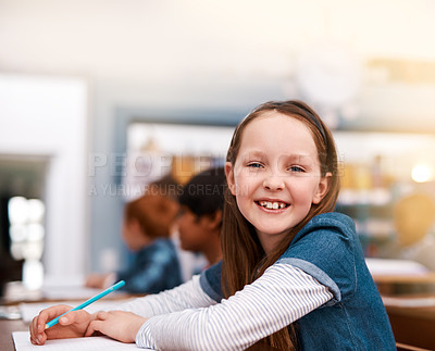 Buy stock photo Portrait, smile and girl in classroom for education in growth, child development and notebook for lesson. Happy, learning and face of student with exam notes, knowledge and study at elementary school