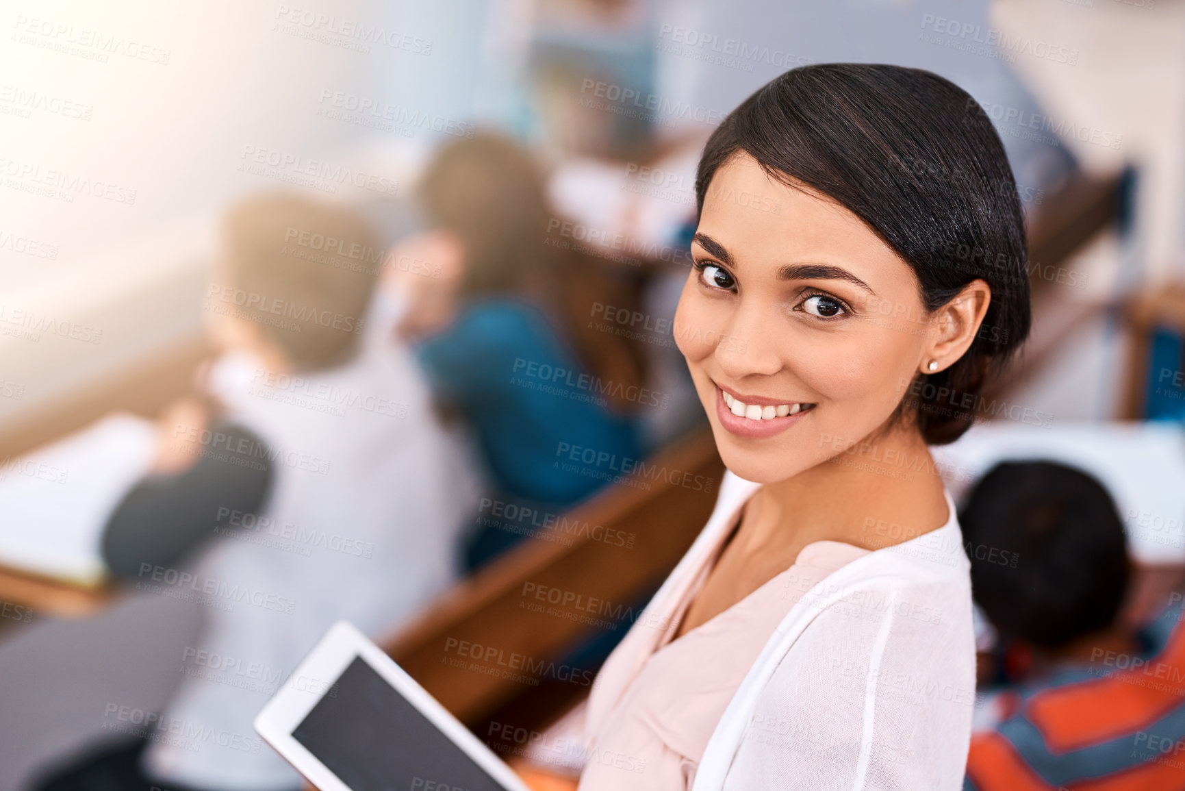 Buy stock photo Portrait, teacher and happy woman with tablet at elementary school for learning, education and study. Face, smile and tutor in classroom with technology for curriculum, course and teaching students