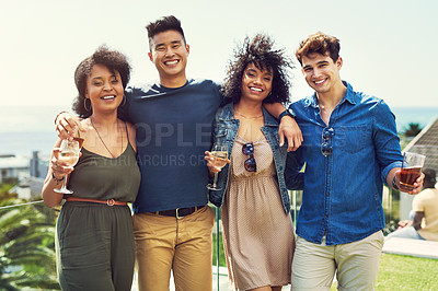 Buy stock photo Portrait of a group of friends having drinks and relaxing outside while on holiday