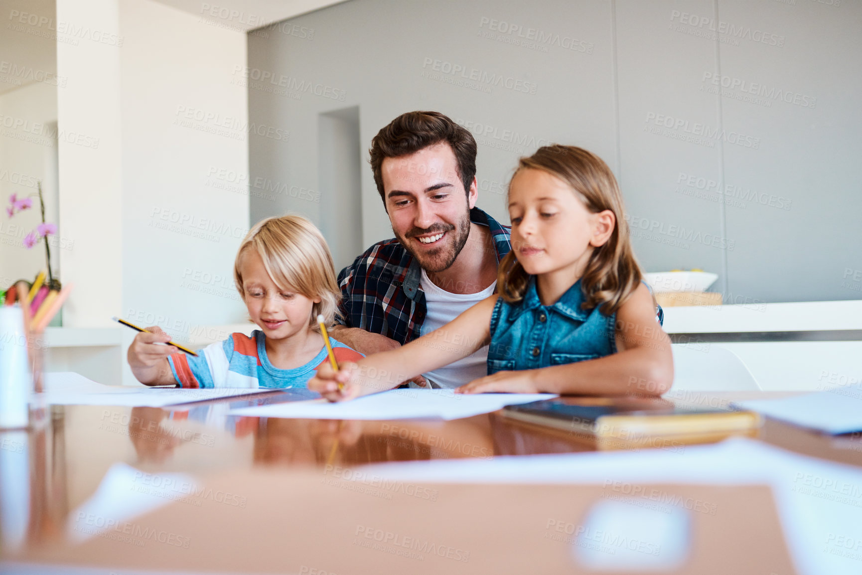 Buy stock photo Father, kids and paper in home for education, distance learning and creativity for growth. Dad, children and happy at table for fun activity, art project and drawing skill development in lesson