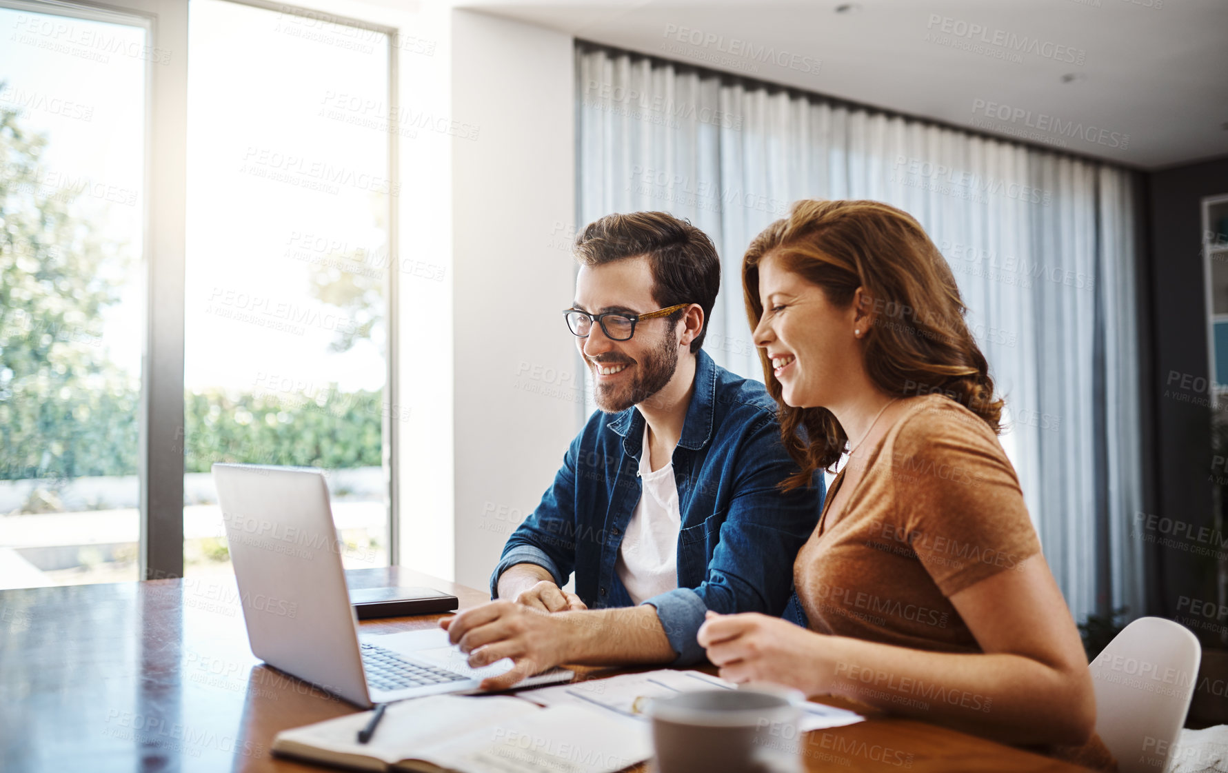 Buy stock photo Man, woman and happy with laptop in house for planning, document for mortgage or savings. Couple, home and computer with paperwork for property loan with growth, profit on investment with real estate