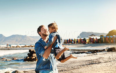 Buy stock photo Happy, father or child at beach for playing, holiday or travel, support in Portugal with boy, toddler or family. Parent, dad or kid at sea for vacation with fun adventure, wellness or nature to relax